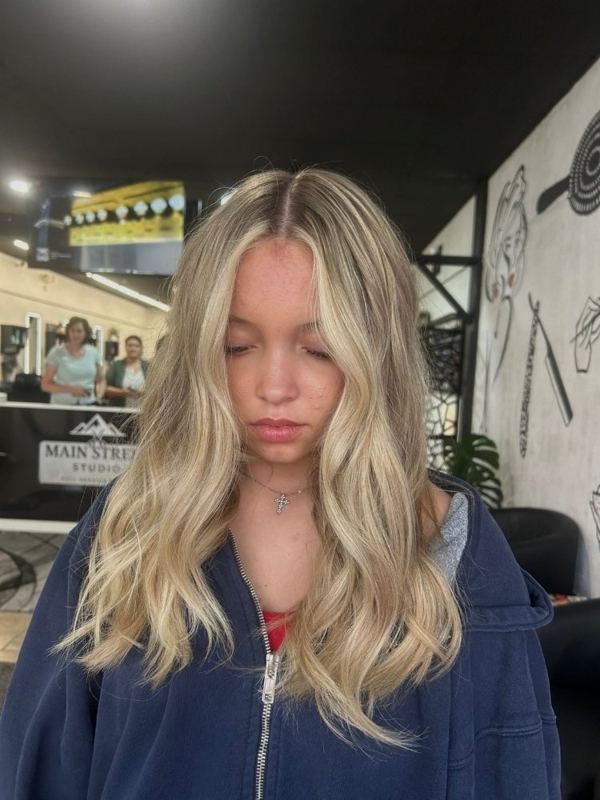 Blonde color and highlights done at Main Street Studio