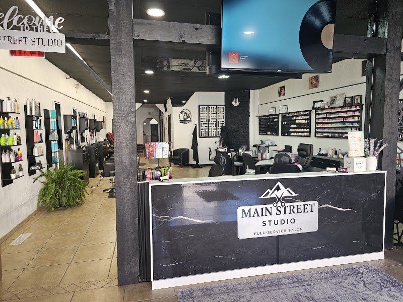 Main Street Studio front desk and logo